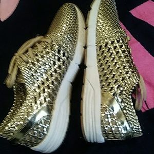 Gold tennis shoes